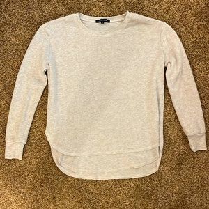 Light-grey crew neck.